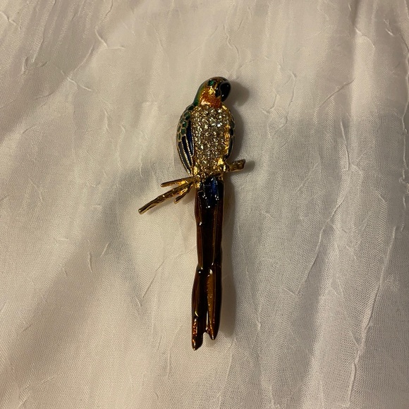 unbranded Jewelry - Enameled parrot pin with white rhinestones and green rhinestone for eyes